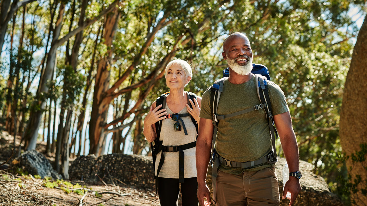 Retiree couple doing hike