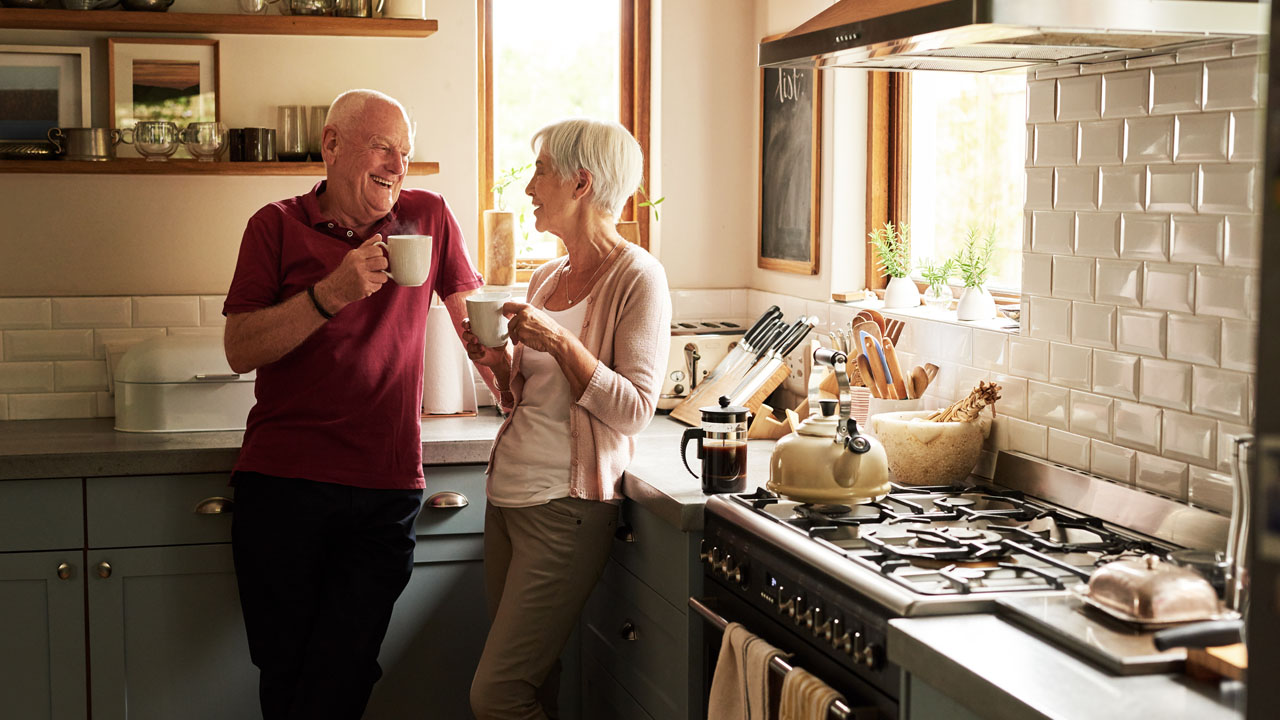 Retiree couple drinking coffee