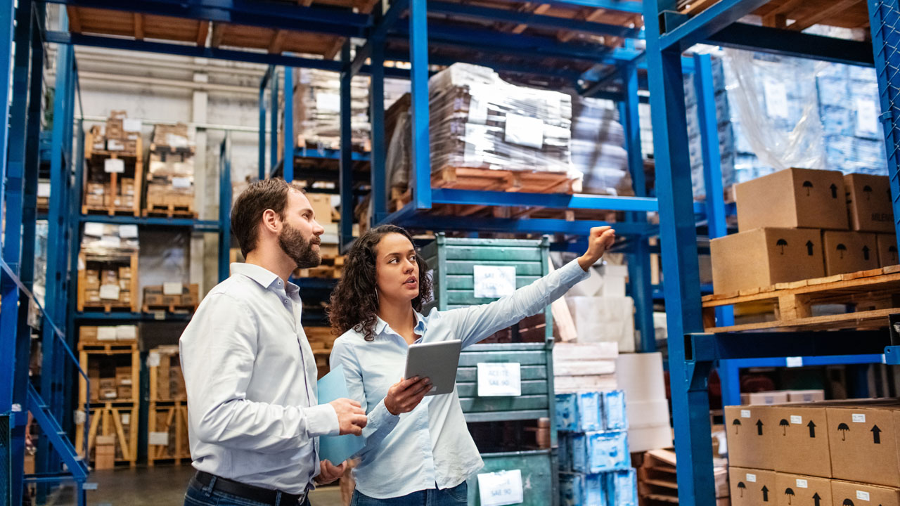 Two business owners on their warehouse